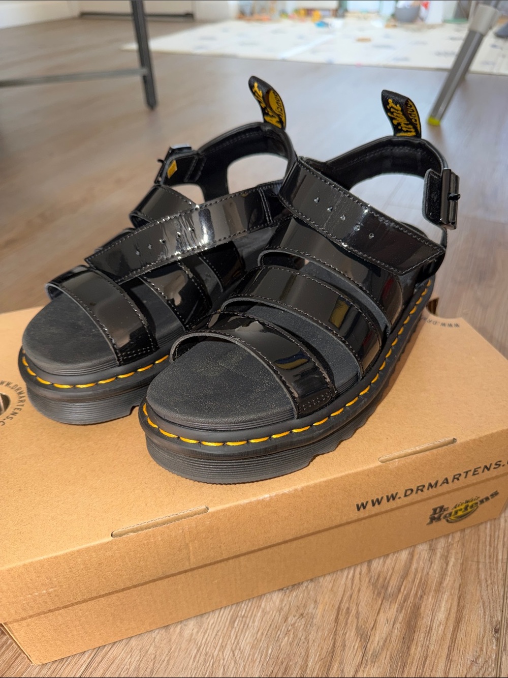 Dr. Martens womens Black Patent Platform Fisherman Sandals with Yellow Stitching